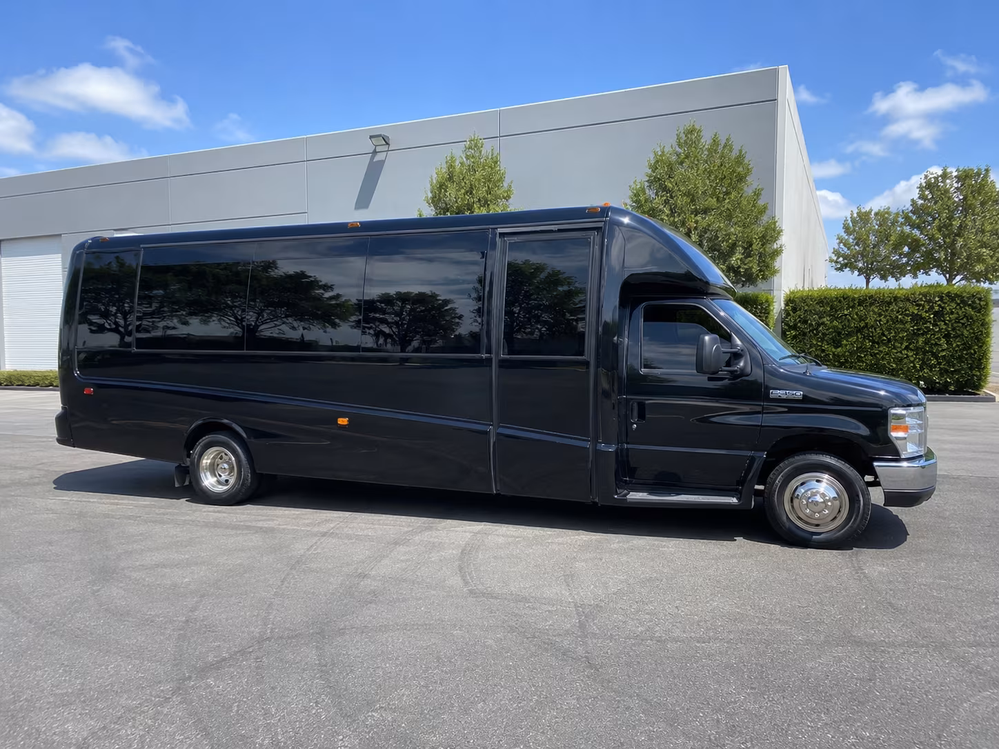 Friends laughing during a party bus celebration in Atlanta