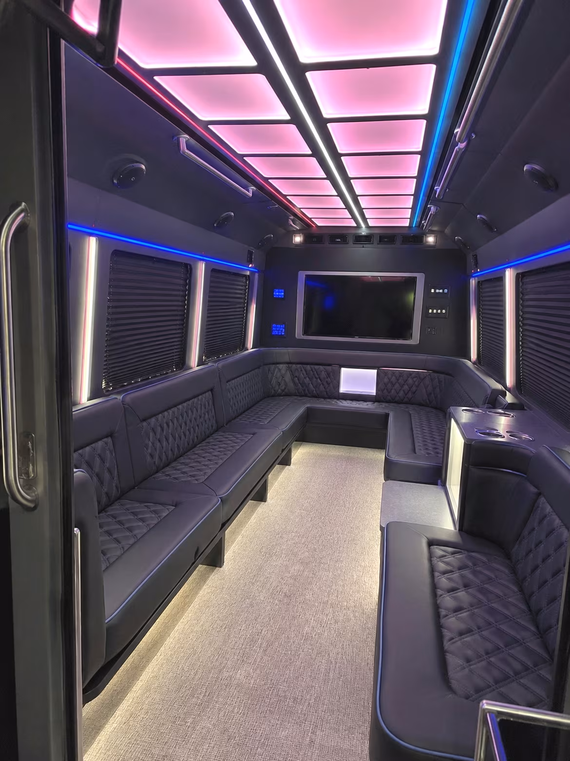 Passenger seating aboard a party bus rental serving Atlanta